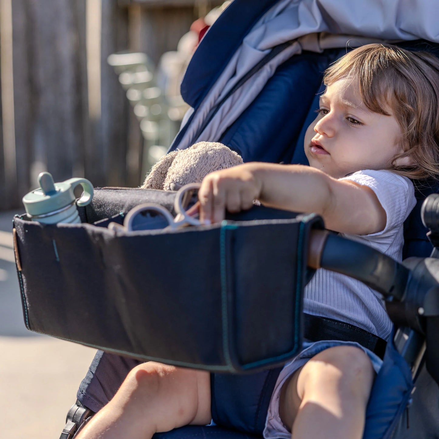 Ezimoov babakocsira szerelhető  tároló